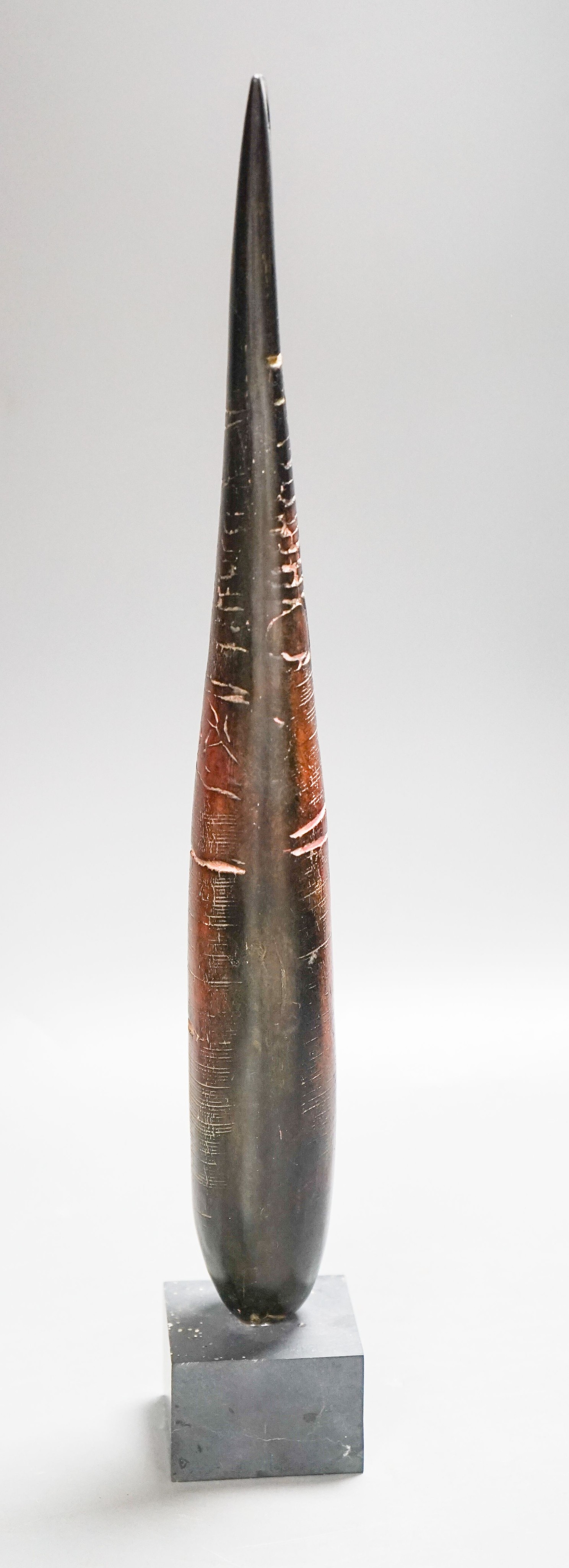 Peter Hayes (b.1946), a brown burnished raku ‘standing stone' sculpture, on a slate plinth 38cm